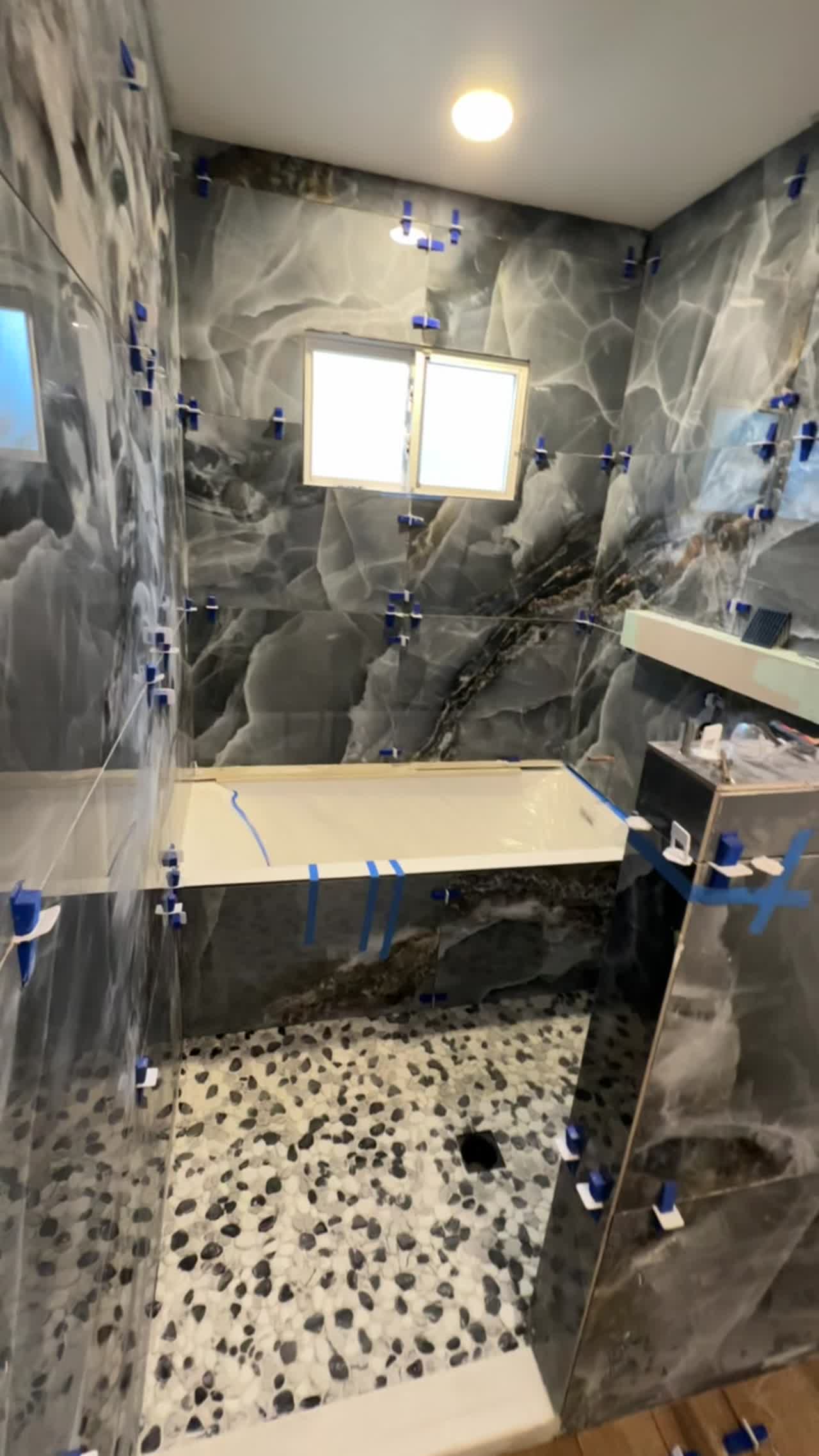 Video walkthrough of a bathroom renovation project